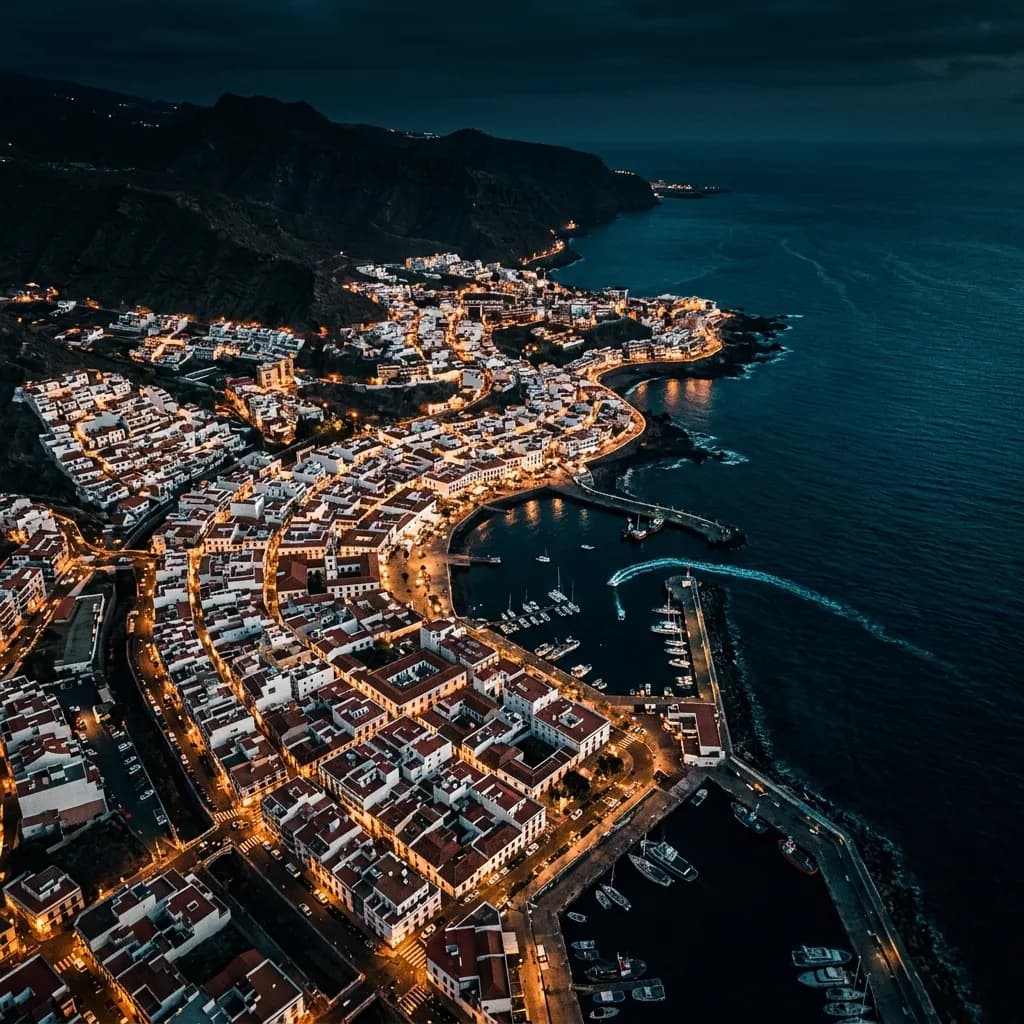 Aerial night view of a Mediterranean coastal town